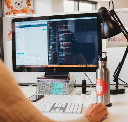 thoughtbot designer working at their desk